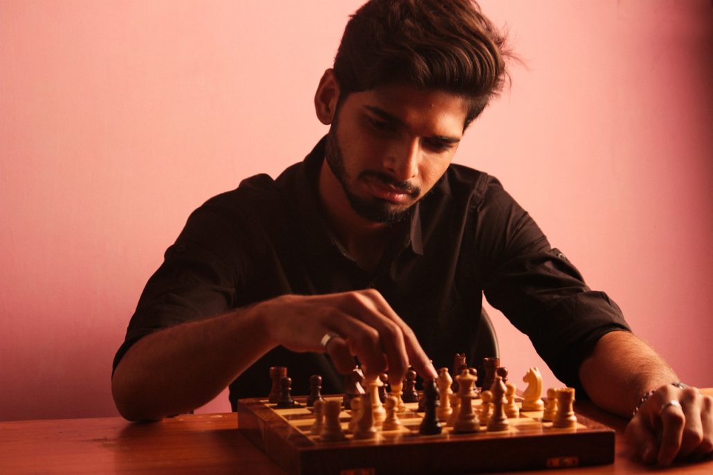 A chess player making his next chess move Stock Photo - Alamy