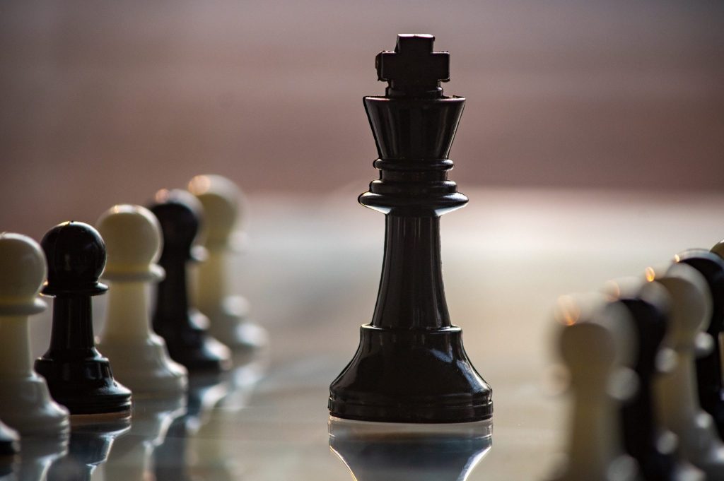 Man playing chess. Play with God or with yourself. Concept - strategy  goals, efforts, plans. Stock Photo