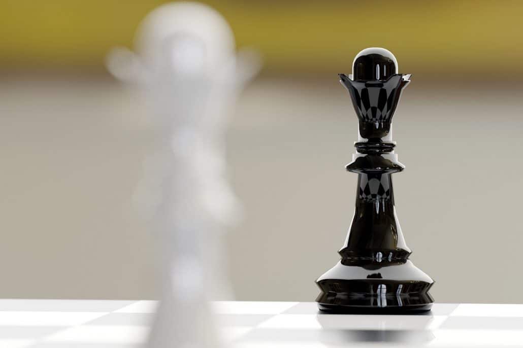 Chess Queen Beats King Between Other Pieces On The Chessboard