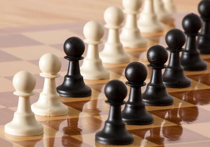 What is the saying about chess and checkers?