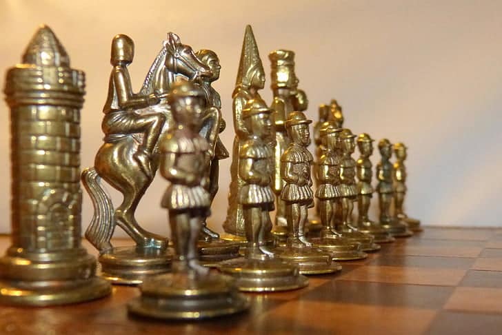What are metal chess pieces made of?